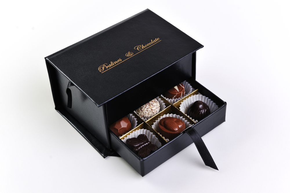 chocolate and praline luxury box with candy and sweets